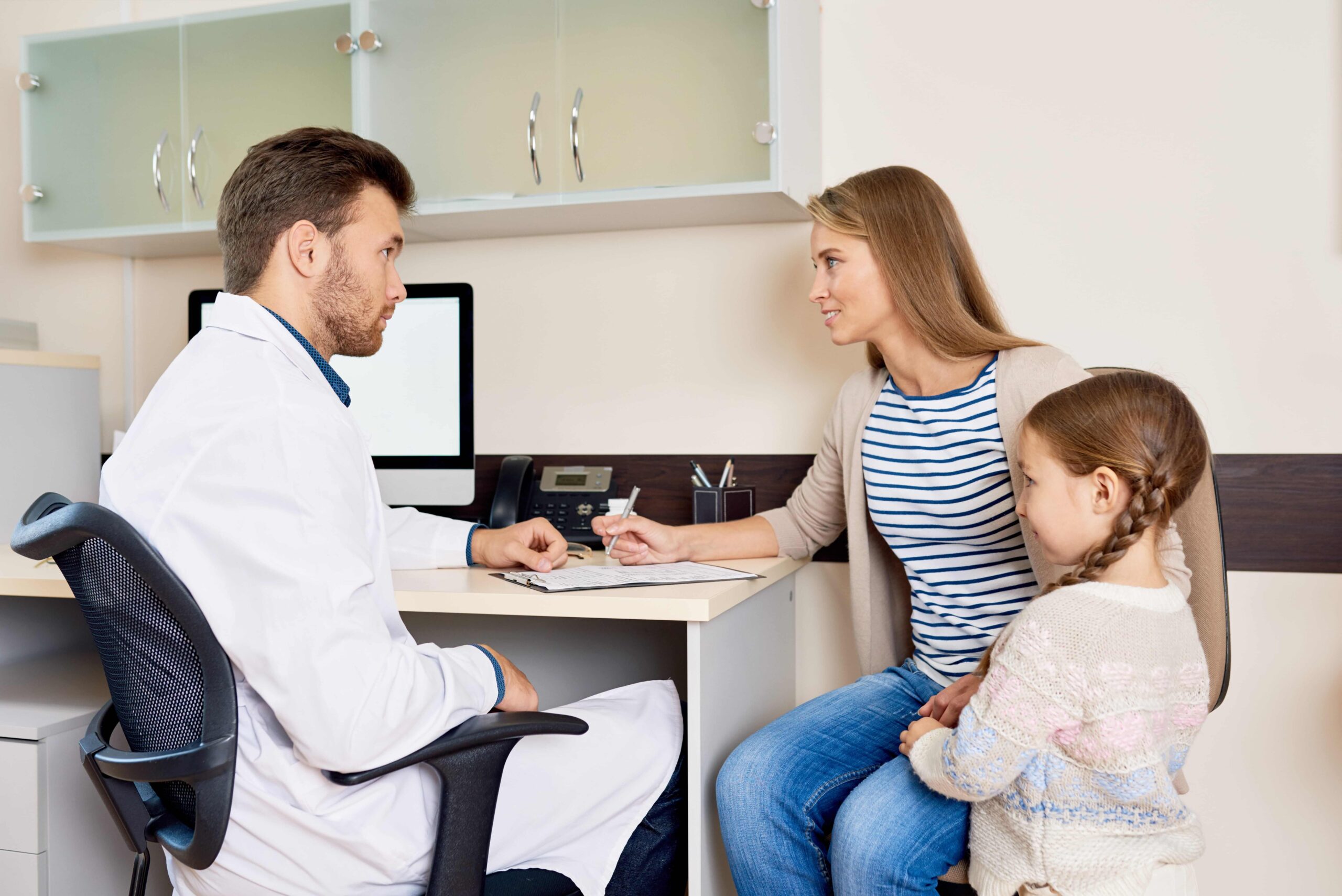 family-visiting-docto